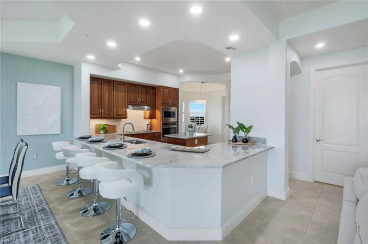 OPEN KITCHEN IS IDEAL WHEN HOSTING LARGE GATHERINGS