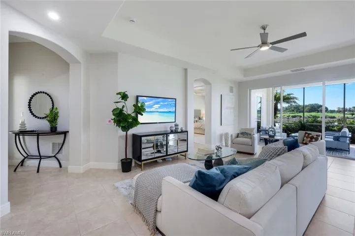 CLEAN LINES, TRAY CEILING, ARCHED ENTRYWAYS AND OTHER TIMELESS ARCHITECTURAL DETAILS