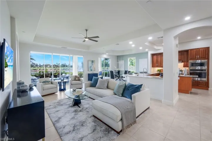 OPEN FLOOR PLAN WITH WIDE VIEWS OF WATER AND GOLF COURSE