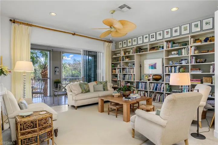 Comfortable family room with built in bookcase.