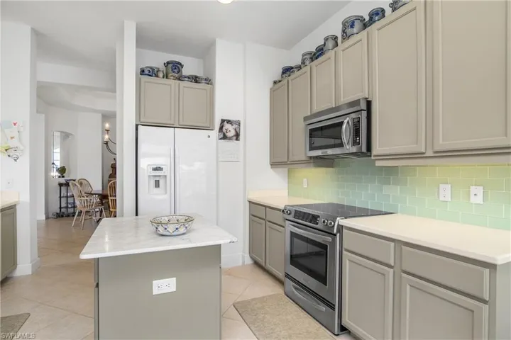Kitchen area leading to dining room