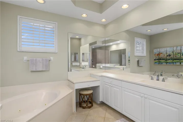 Master bath with dual sinks, separate jetted tub and shower