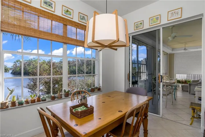 Kitchen breakfast room looking toward lake and lanai