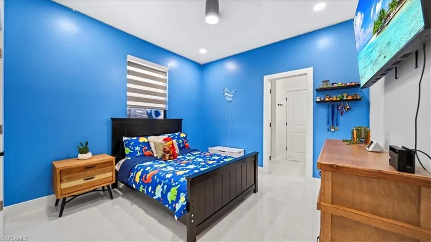 Bedroom featuring ceiling fan and recessed lighting