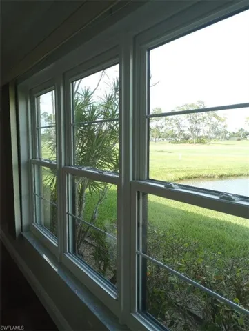 Living Room Windows overlooking pond and Golf Course