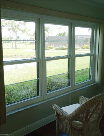 Den to pond & Enclosed Pool view