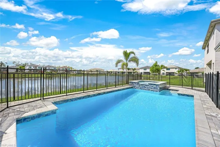 View of pool featuring a water view