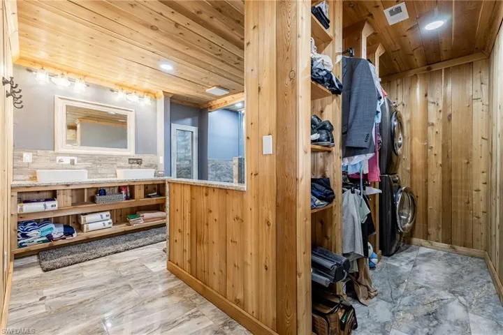 Storage featuring stacked washing machine and dryer