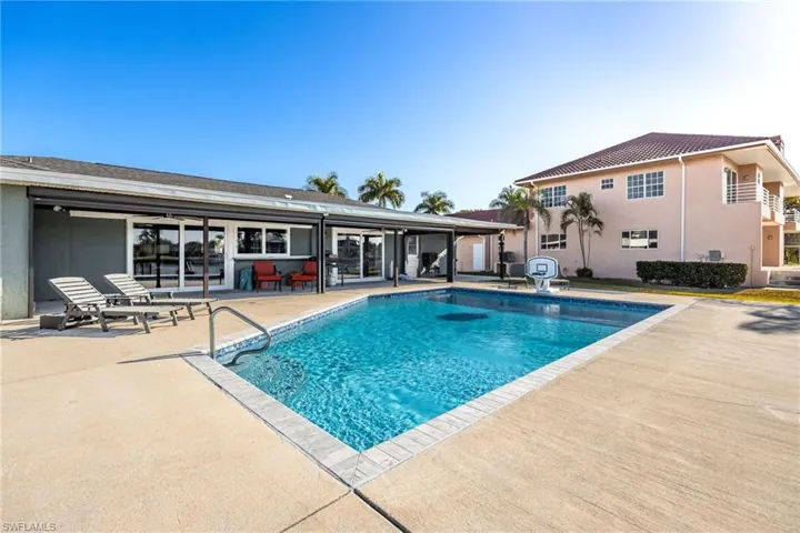 Outdoor pool featuring a patio