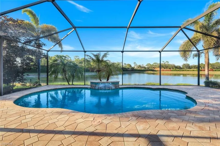 View of pool , a water view, and a patio