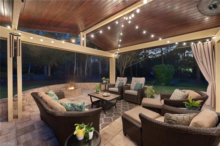 Pergola & wood burning fire pit at dusk
