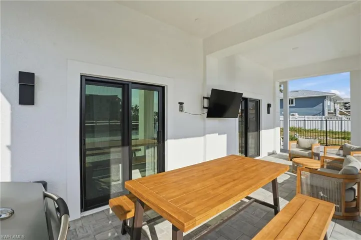 View of patio / terrace with outdoor dining space and an outdoor living space