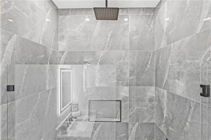 Bathroom view of tiled shower