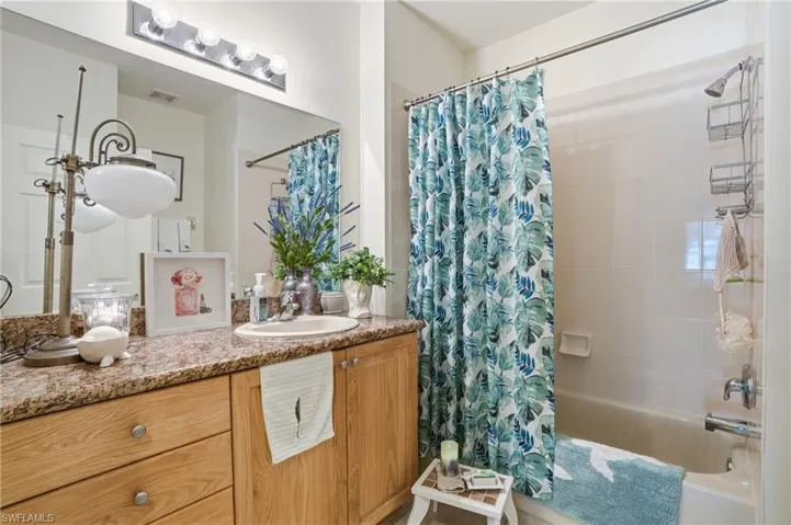 Oak vanities with granite countertops