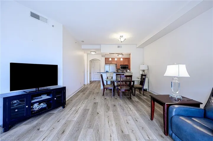 Dining area with light hardwood / wood-style floors