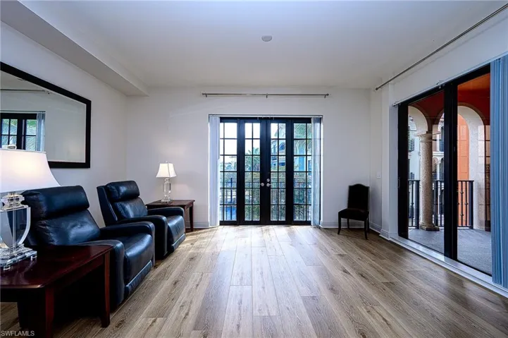 Laminate flooring replaced carpet in Living room and french doors