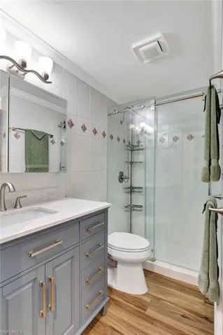 Beutifully renovated bathroom with frameless shower doors.
