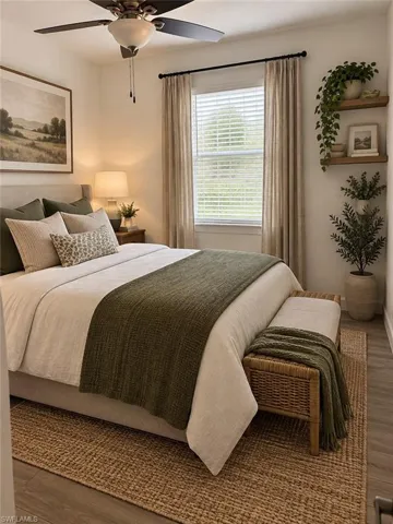 ai Wood-finish flooring with a woven area rug, ceiling fan with integrated lighting, window with blinds and drapes, and built-in floating shelves