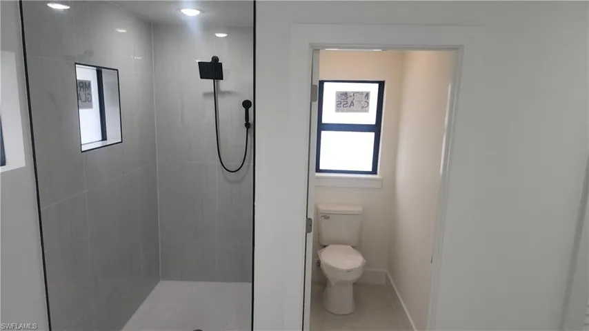 Large walk in shower, private lavatory