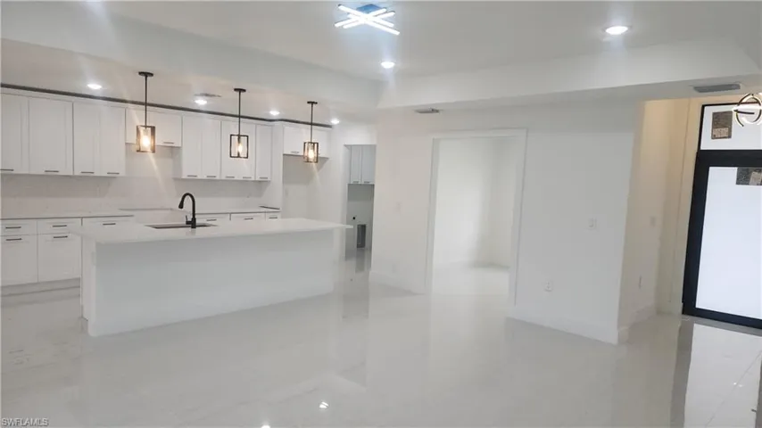Large island, granite counters, stainless steel appliances will be installed prior to closing