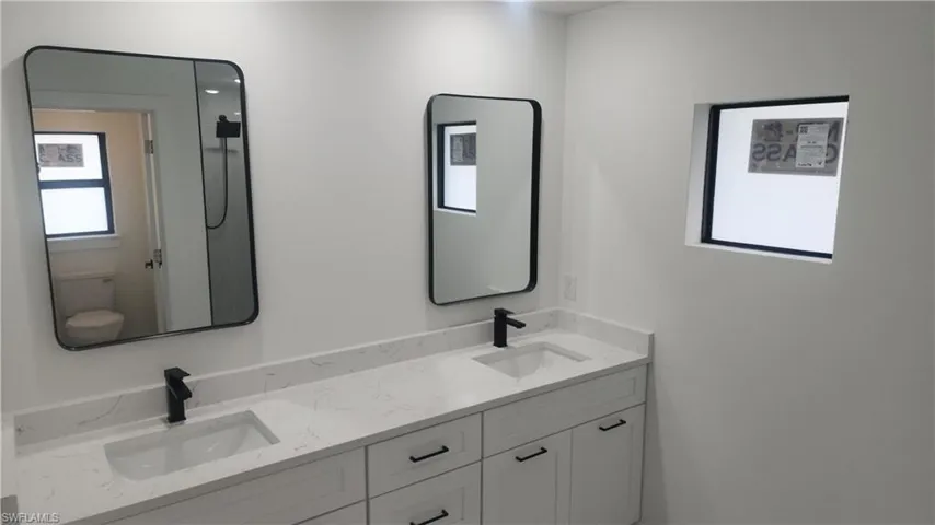 dual vanity, modern lights and fixtures