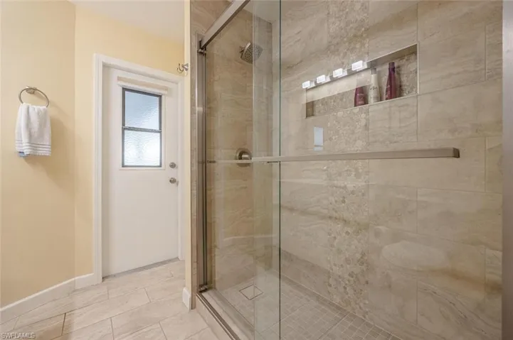Bathroom featuring a shower stall