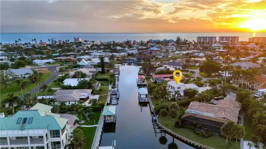 Drone / aerial view featuring a water view Virtually enhanced image