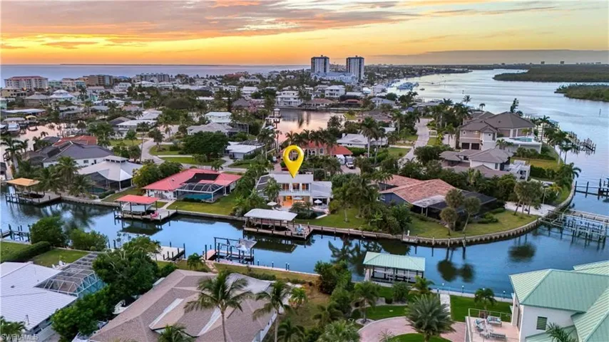 Aerial perspective of area featuring a nearby body of water