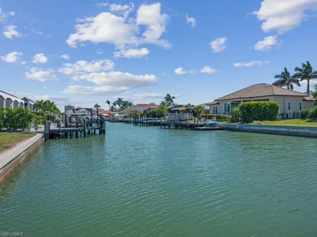 Water view featuring a dock