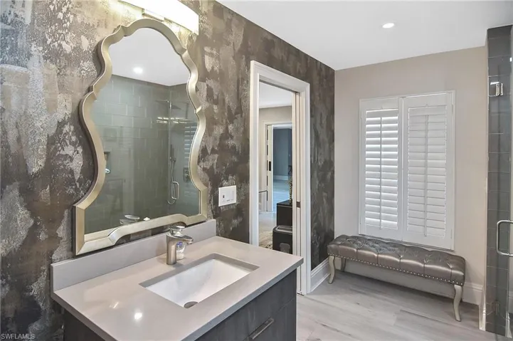 Bathroom with wood-type flooring and vanity