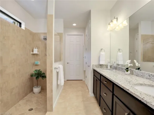 Oversized Walk-in Owner Shower w/Dual Vanities