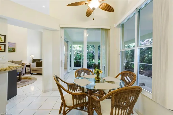 Breakfast nook in kitchen, with impact sliders to lanai