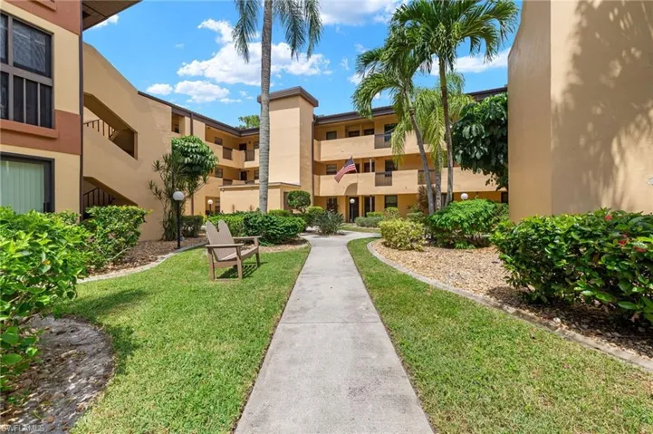 View of home's community featuring a yard