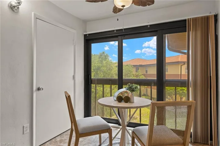 Dining space with a ceiling fan