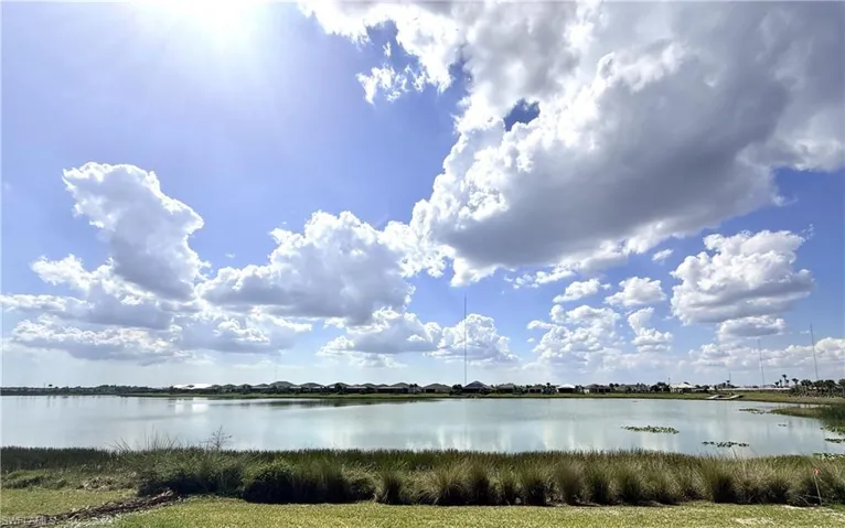 Beautiful backyard water view with western exposure on Lake Babcock
