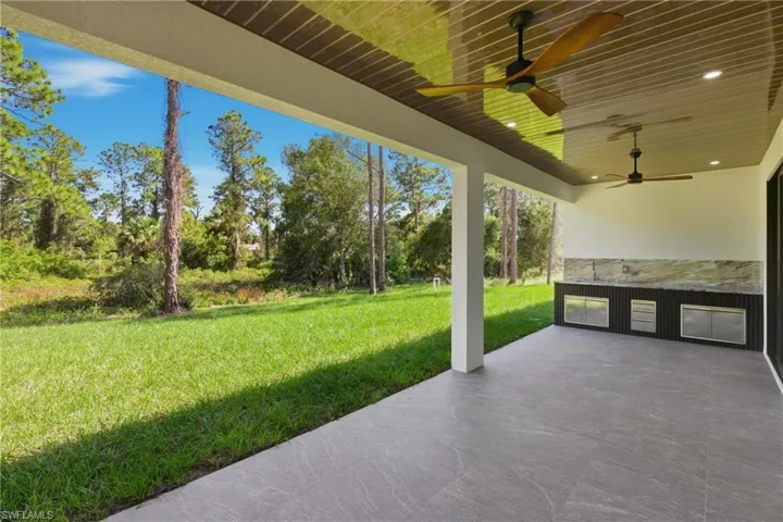 View of patio with ceiling fan