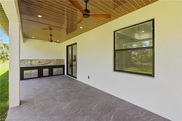 View of patio / terrace featuring ceiling fan