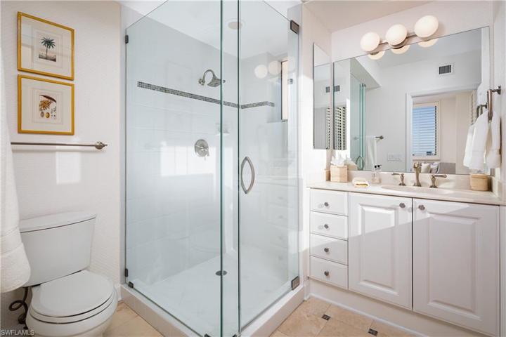 En Suite Guest Bathroom with expansive Pelican Bay views.