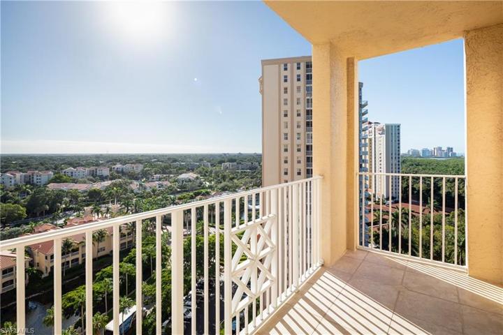 Front Lanai off of Family Room, Showcasing Panoramic Views of Pelican Bay. Panoramic Views of Pelican Bay are visible from almost every room of property.
