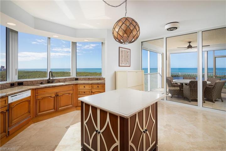 Sweeping Gulf of Mexico Views and Park Shore Skyline Views from Kitchen and Screened in Lanai Dinning Area.