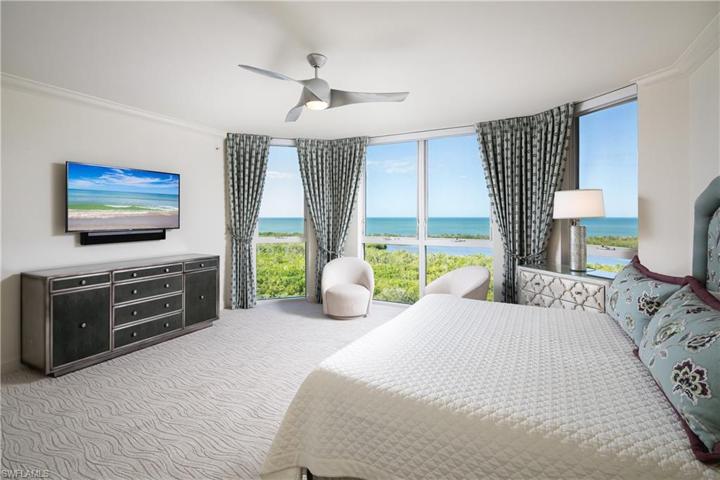 Outward facing back corner of Primary Bedroom. Floor to Celling Window Direct Western Facing Gulf of Mexico and Inner Clam Bay views.
