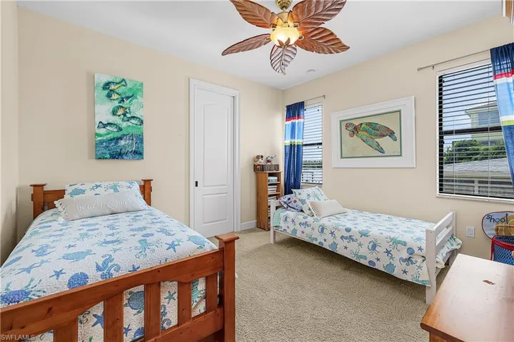 Neutral wall tones with carpeted flooring