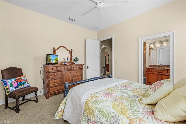 Bedroom featuring carpet flooring and a ceiling fan