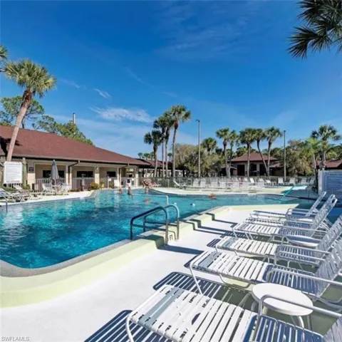 Community pool with a patio area