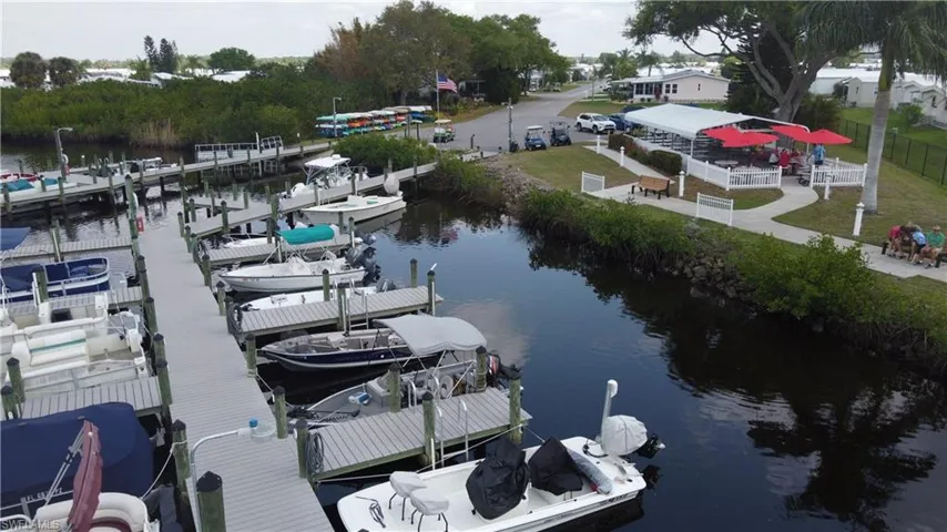 Dock featuring a water view and boat lift