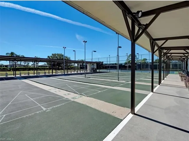 View of home's community with shuffleboard