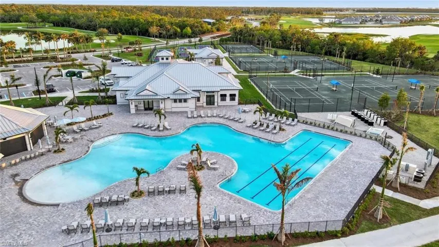 View of swimming pool with a water view