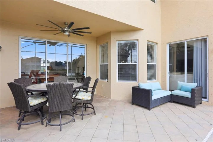 View of patio / terrace featuring ceiling fan and outdoor dining space