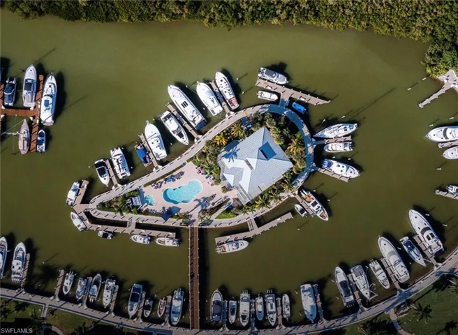 Waterfront community featuring an extensive marina with numerous boat slips