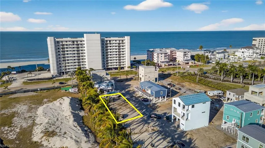 Vacant parcel of land featuring proximity to the coastline and coastal vegetation
